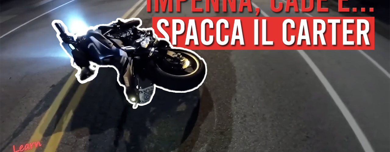 Impenna e cade in moto